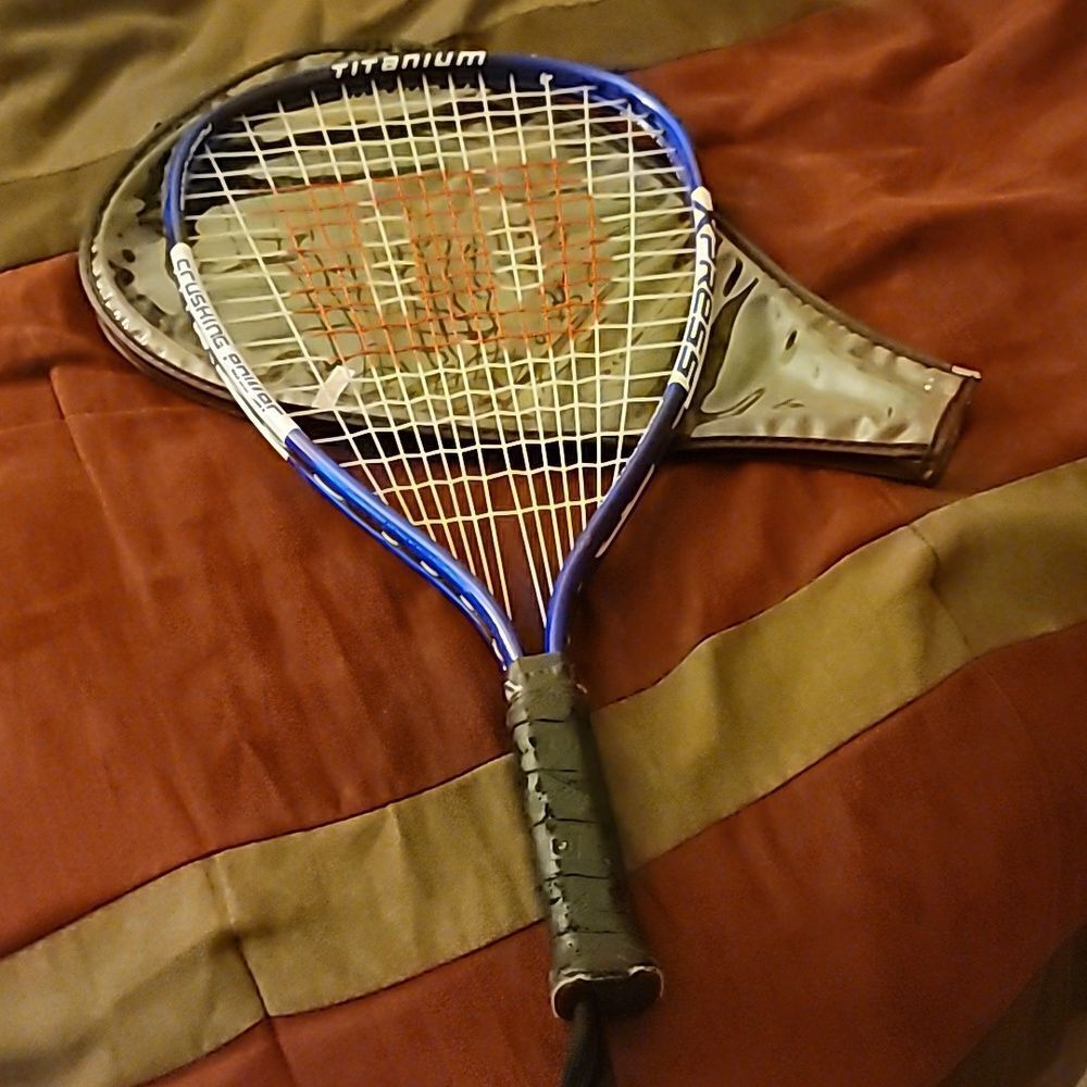 Racket ball paddle by Wilson